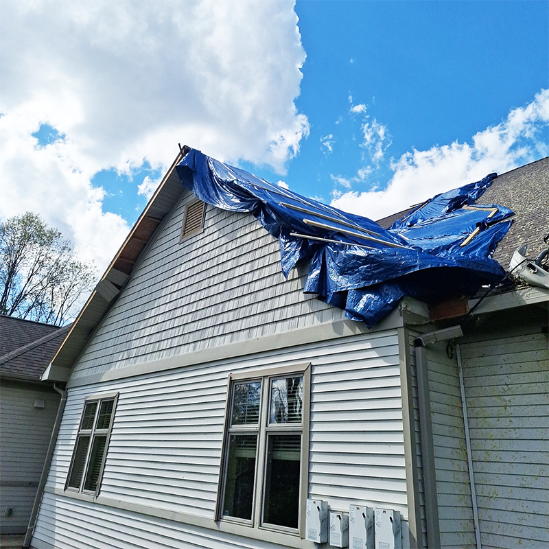 storm damage roof repair tarp