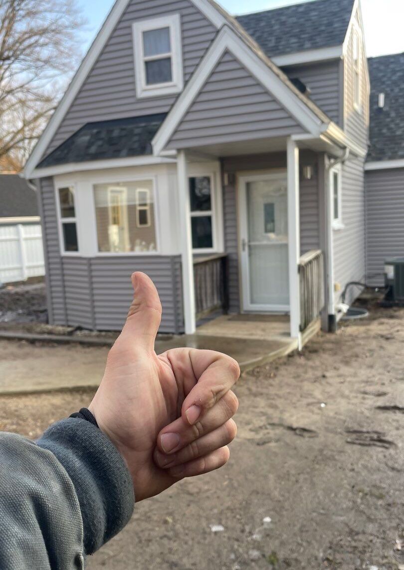 Siding Replacement thumbs up